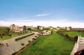 Jagannath University campus with transport bus, Jaipur